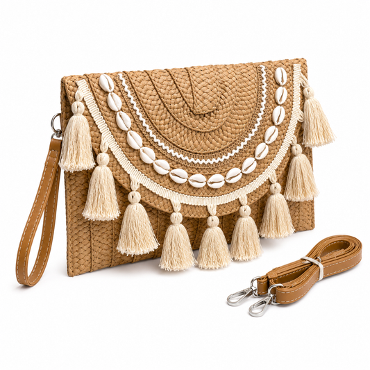 Detail of boho clutch showing layered raffia tassels and cowrie shell embellishments — MOUJ Egypt