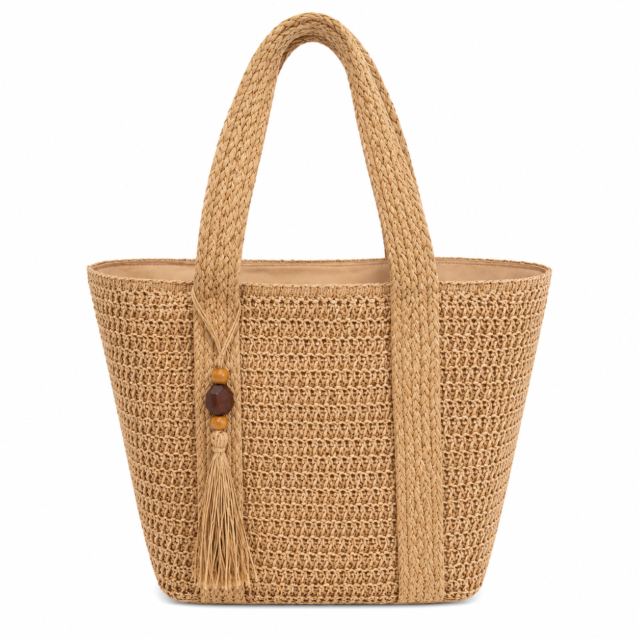 Detail of cream crochet beach tote showing hand-crocheted cotton weave and raffia tassel with brown wooden beads — MOUJ Egypt