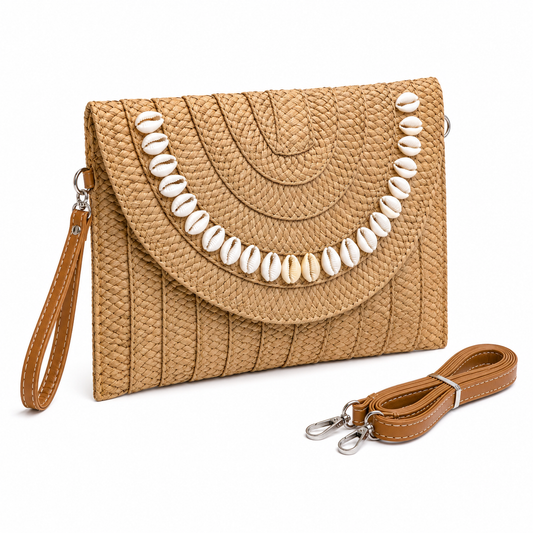 Detail of cowrie shell clutch showing real shells hand-sewn on natural straw weave — MOUJ Egypt