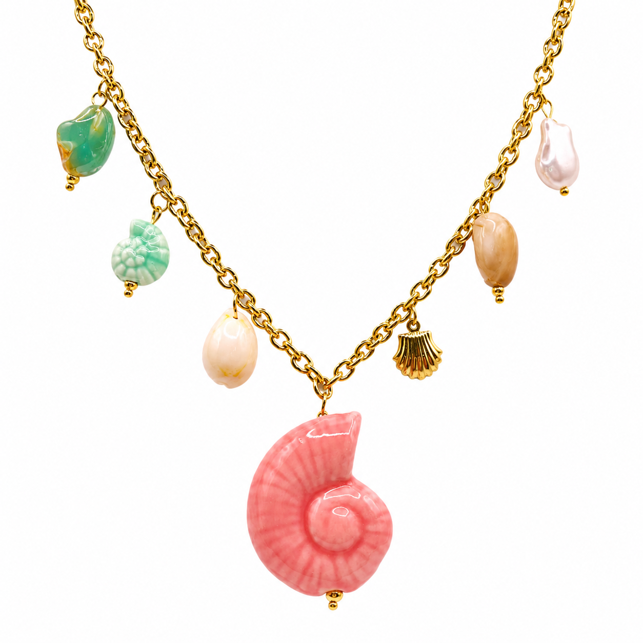 Gold chain necklace with pink nautilus spiral pendant and pearl charms